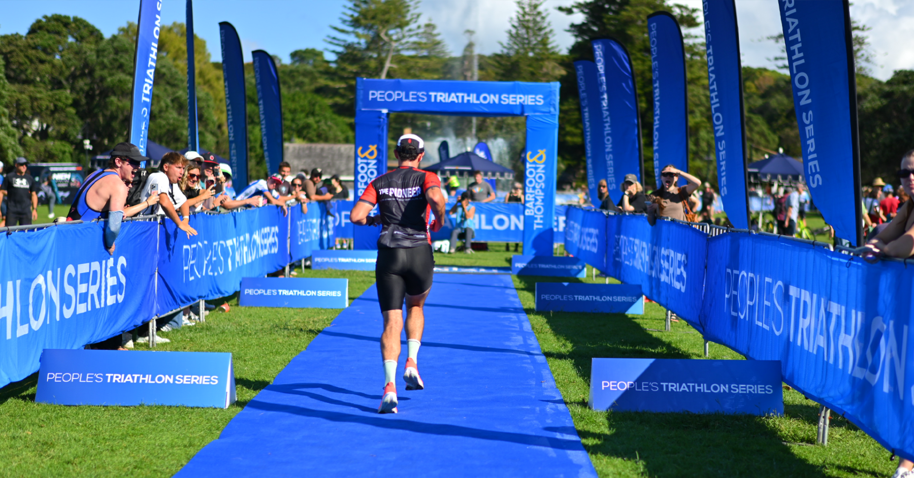 Athletes and supporters at the People's Tri finish chute