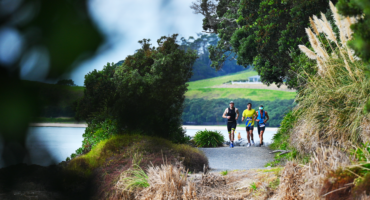 Runners on the coastal path at Maraetai Beach.