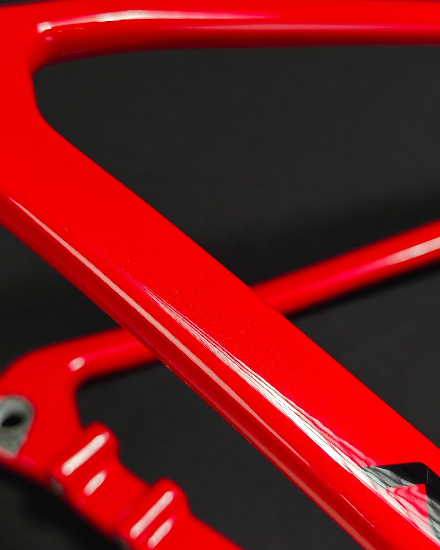 Close-up of the Ferrari metallic red paint on Darryl’s NICH frame
