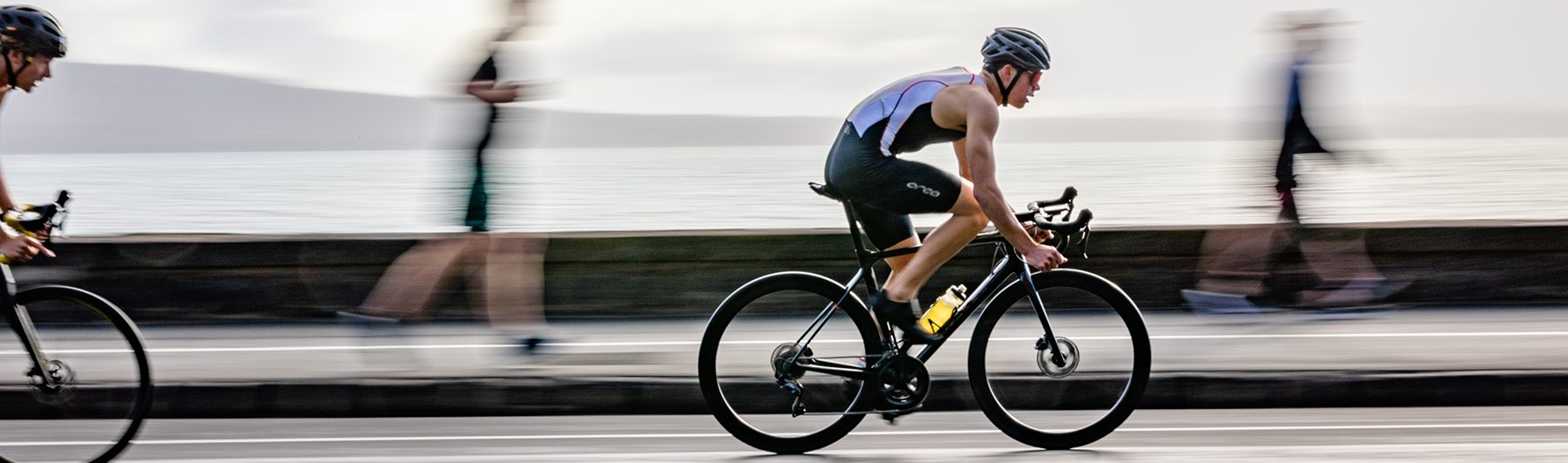 A cyclist on the Auckland waterfront at Mission Bay